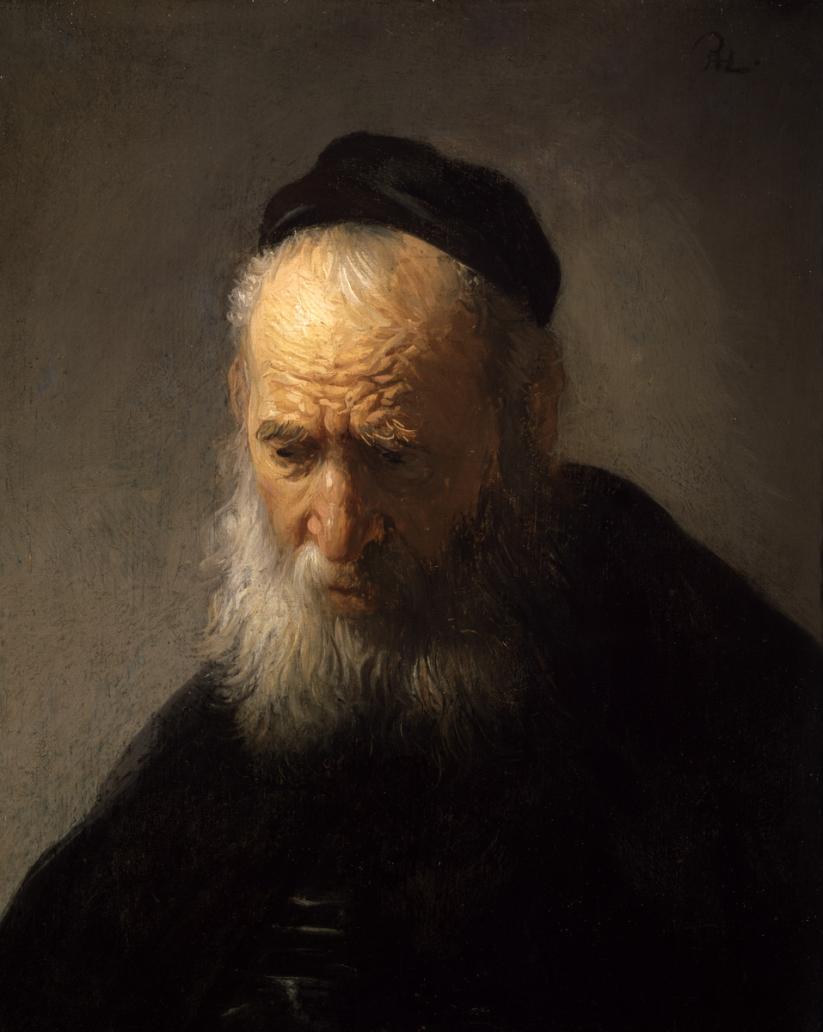 Shadowy Dutch portrait of a bearded elderly man in black skull cap
