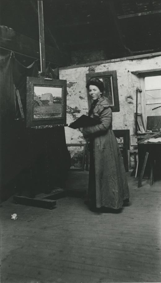 Unknown photographer, Helen McNicoll in her studio at St. Ives, c. 1906.
