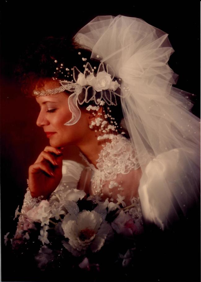 wedding portrait of a bride in large headdress