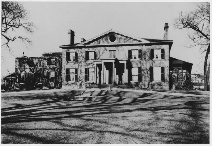 an archival black and white photo of a historical home in Toronto