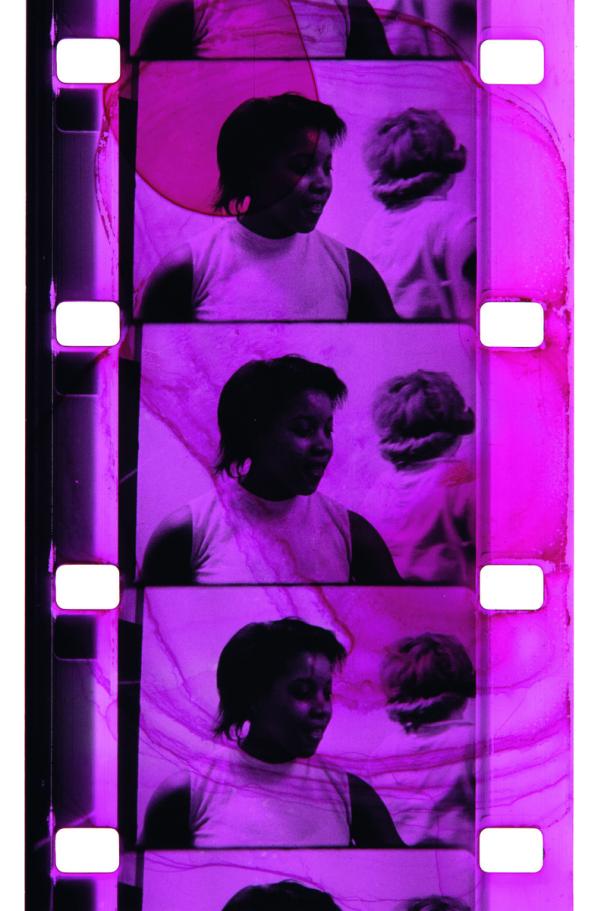 A film strip showing stills from a film made by Joyce Wieland