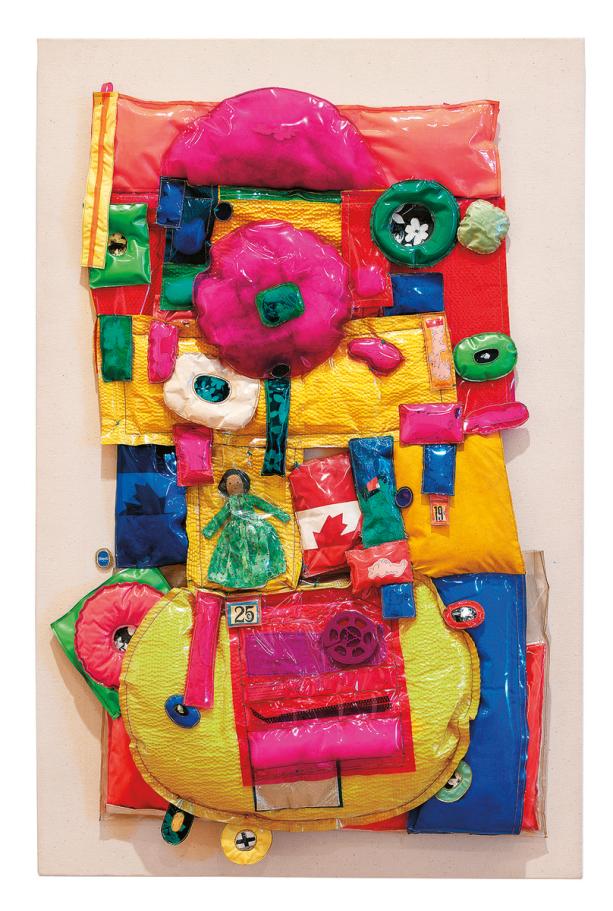 An image of Joyce Wieland's work Puerco de Navidad, which is a vibrant plastic quilt