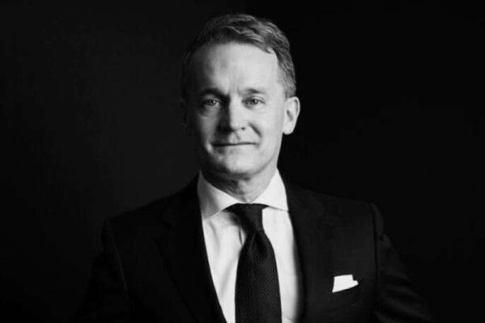 A black and white photograph of Seamus O'Regan