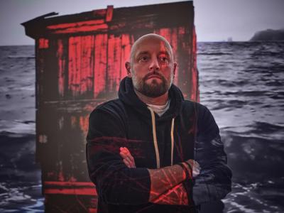 Artist Jerry Ropson with his work, Still.Drift.Return, 2025, commissioned for David Blackwood: Myth &amp; Legend,