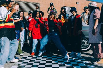 a group of women dancers doing street dance