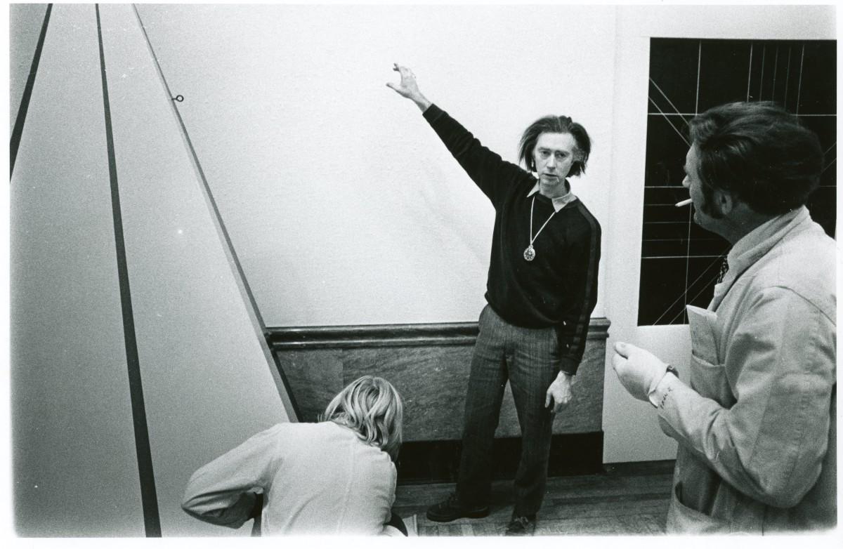 Michael Snow, artist, and two AGO preparators