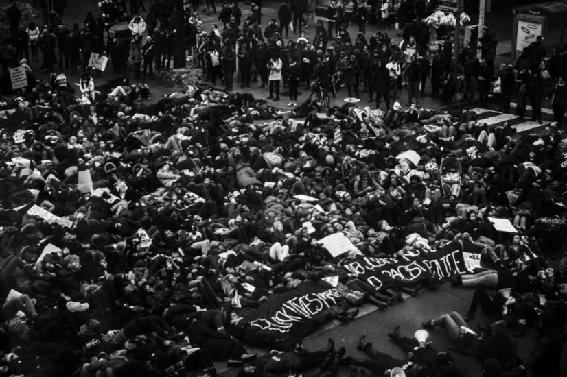 Jalani Morgan, Protesters perform a ‘die-in’ by laying on the ground at Yonge and Dundas Square in Toronto, 2014,