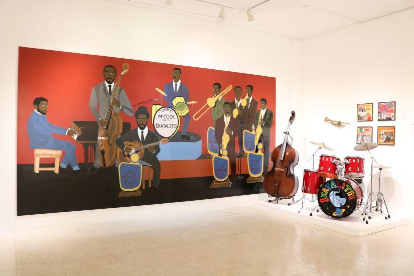 Jamaica Jamaica! exhibition installation. Skatalites Mural by Ras Lava and Skatalites Drum Set.