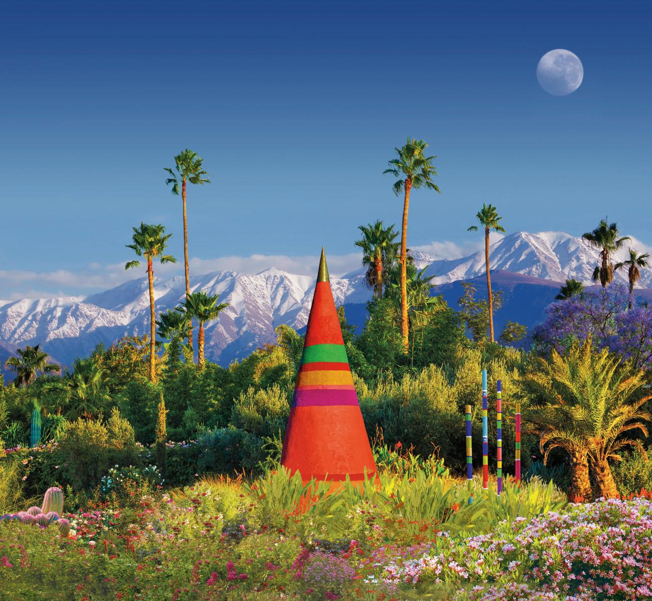 view of palm trees and triangle sculpture with mountains in distance