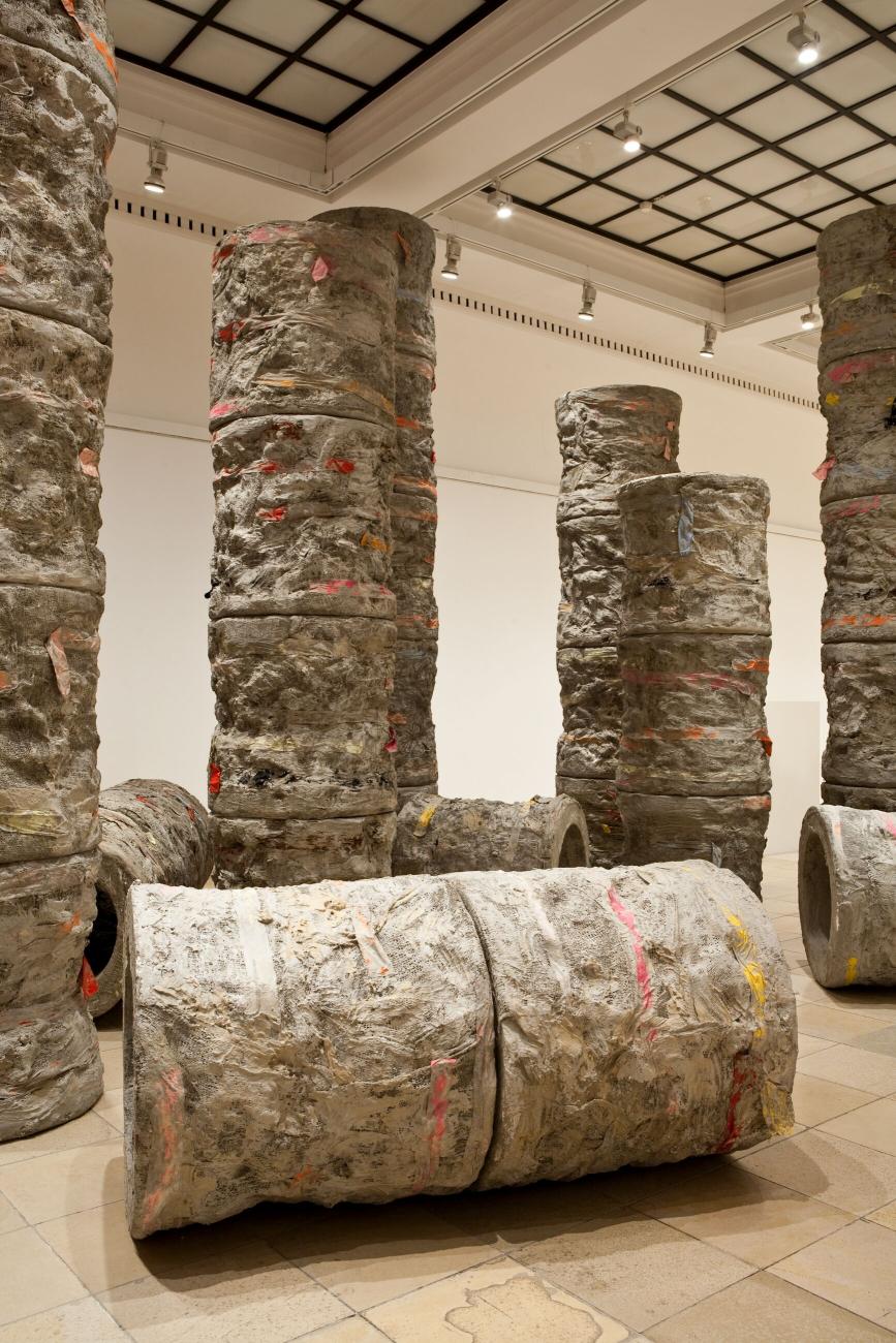 A series of cement columns of various lengths