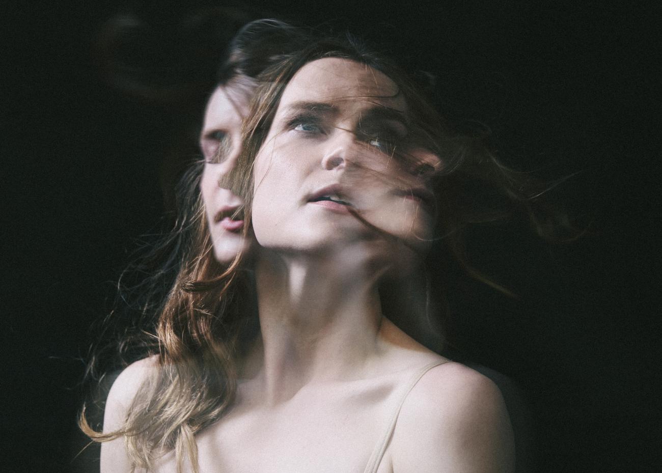 Dancer Hannah Galway in Emma Bovary. The image superimposes Hannah looking in multiple directions