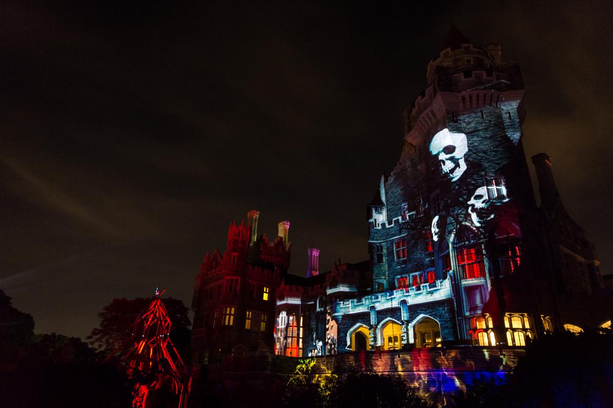 An image of Castle Loma with skulls projected on it