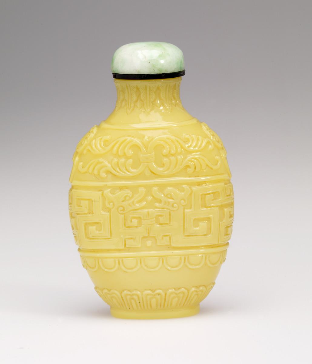 Snuff Bottle, with carved dragons and scrolls,