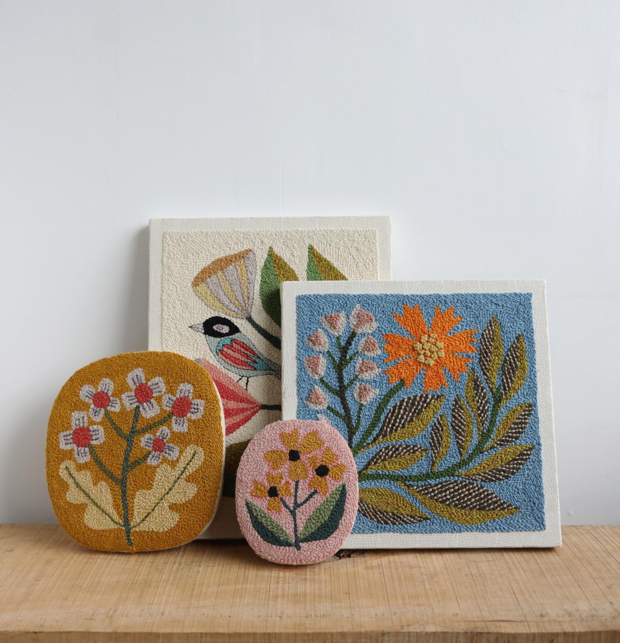 A photograph of Arounna Khounnoraj's punch needle work, which includes various flowers