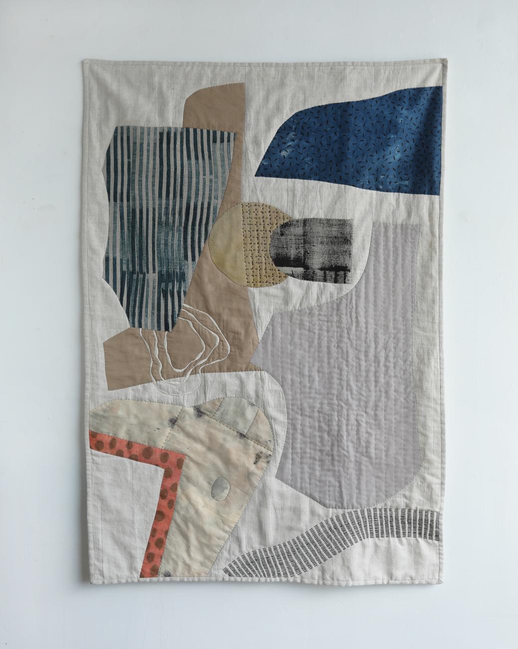 An image of one of Arounna Khounnoraj's abstract patchwork quilts