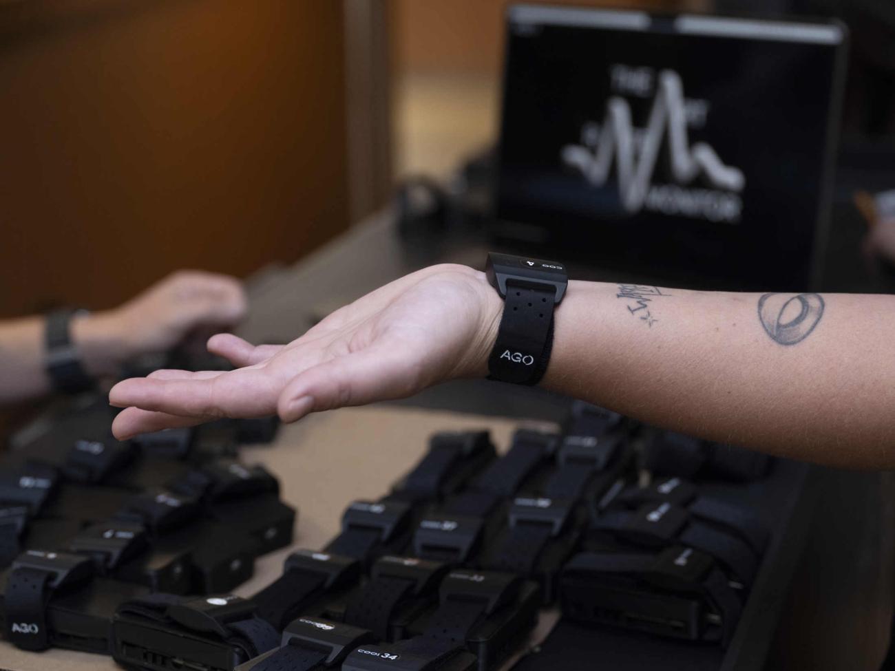 Person with art rate monitor on wrist