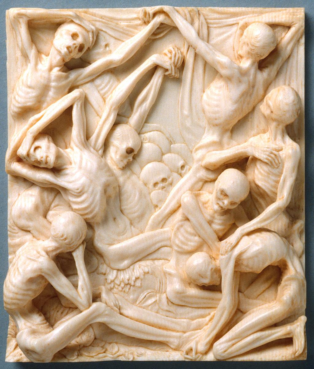 Ivory plaque depicting skeletons dancing together