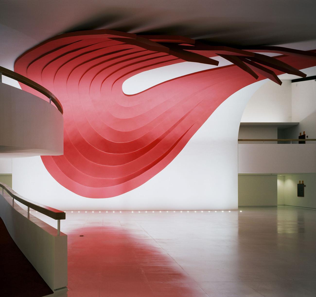 Red public art sculpture by Tomie Ohtake