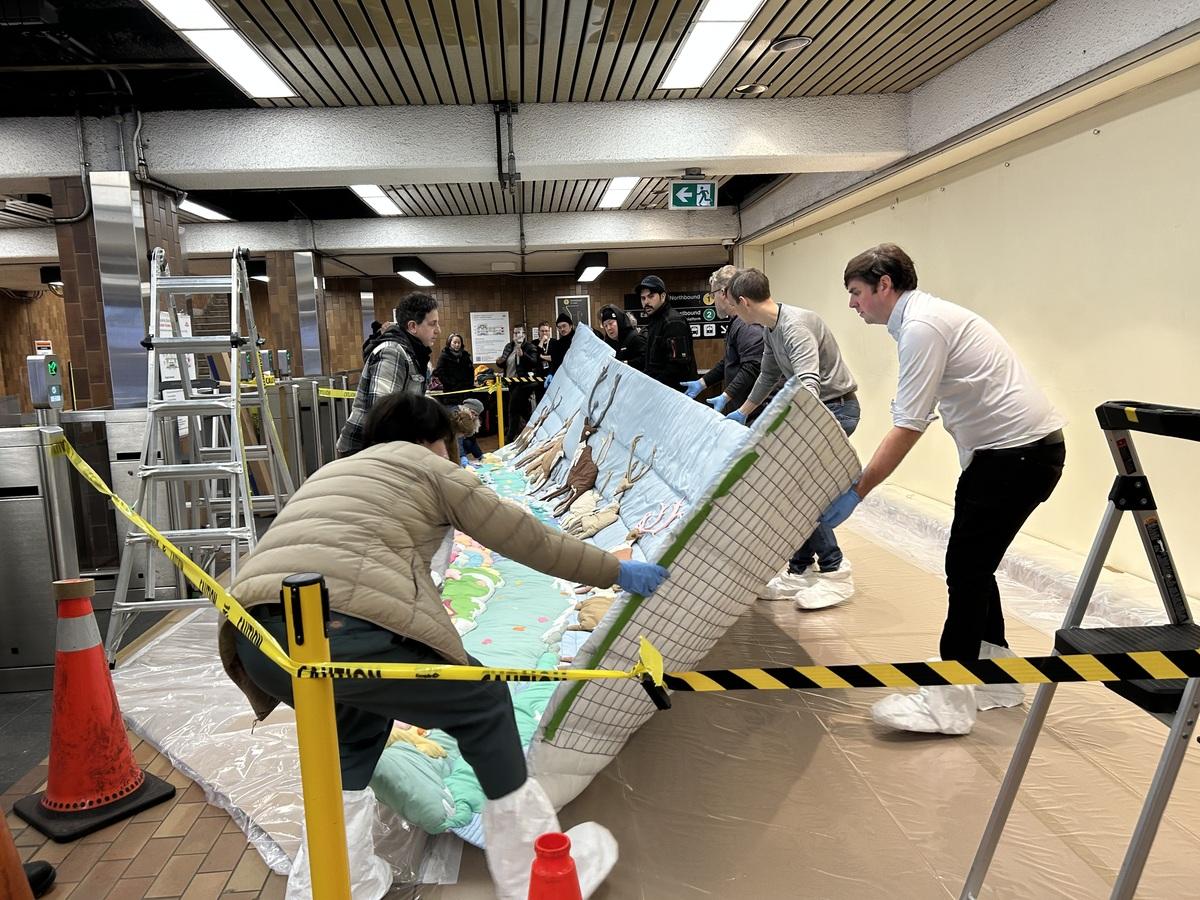 Deinstallation of Joyce Wieland, Barren Ground Caribou, 1977-1978, at Spadina Subway Station