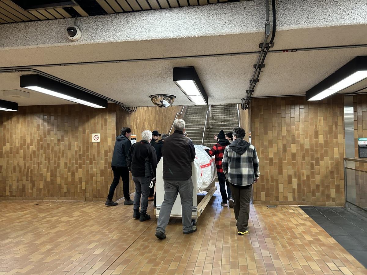 Deinstallation of Joyce Wieland, Barren Ground Caribou, 1977-1978, at Spadina Subway Station