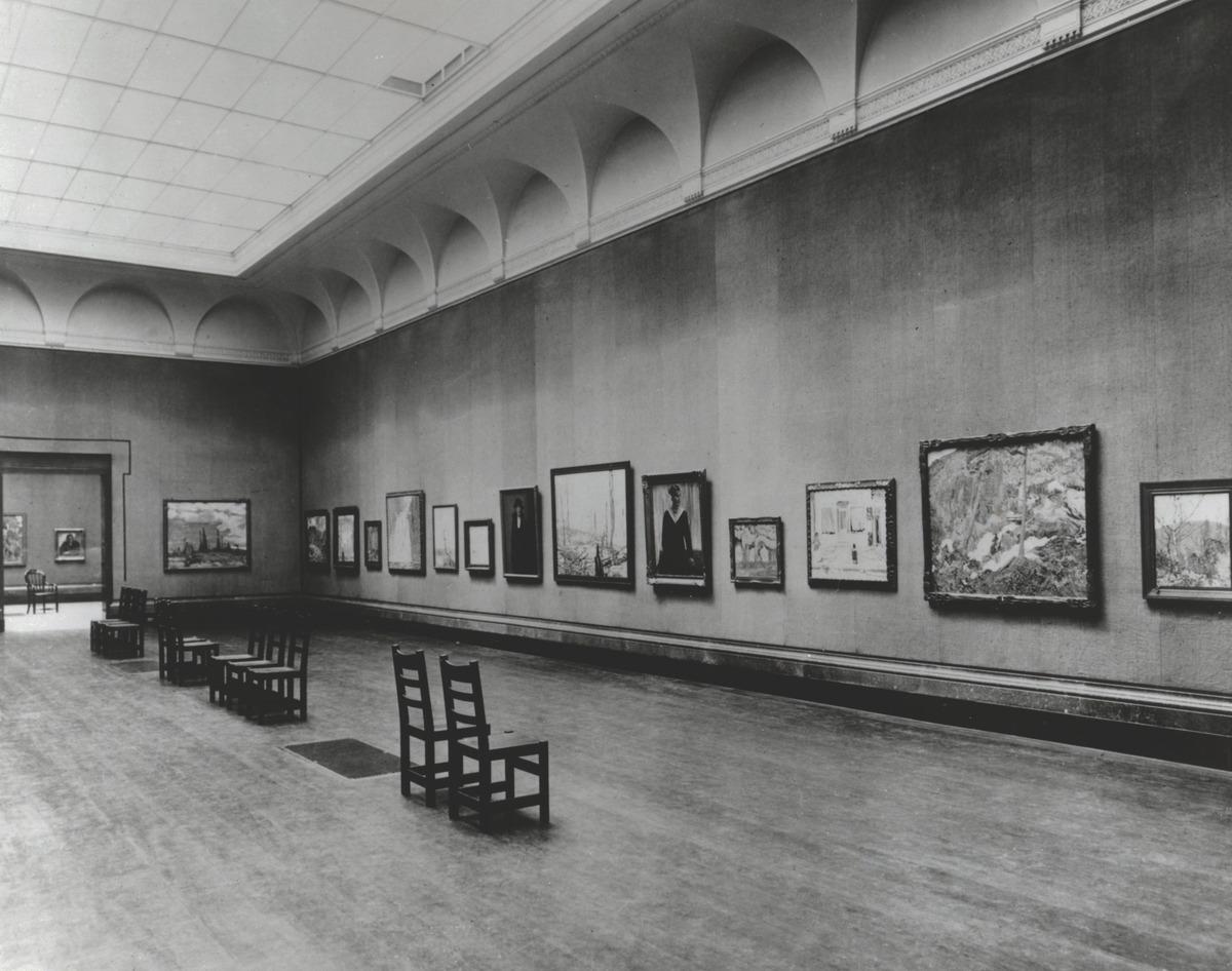 A photo of the first Group of Seven exhibition at the Art Gallery of Toronto (now the Art Gallery of Ontario) in 1920