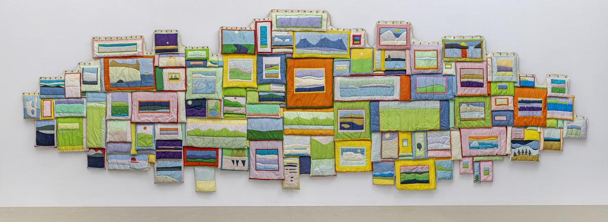 An image of Joyce Wieland's quilt 109 views, which features squares with different views of landscapes stitched together