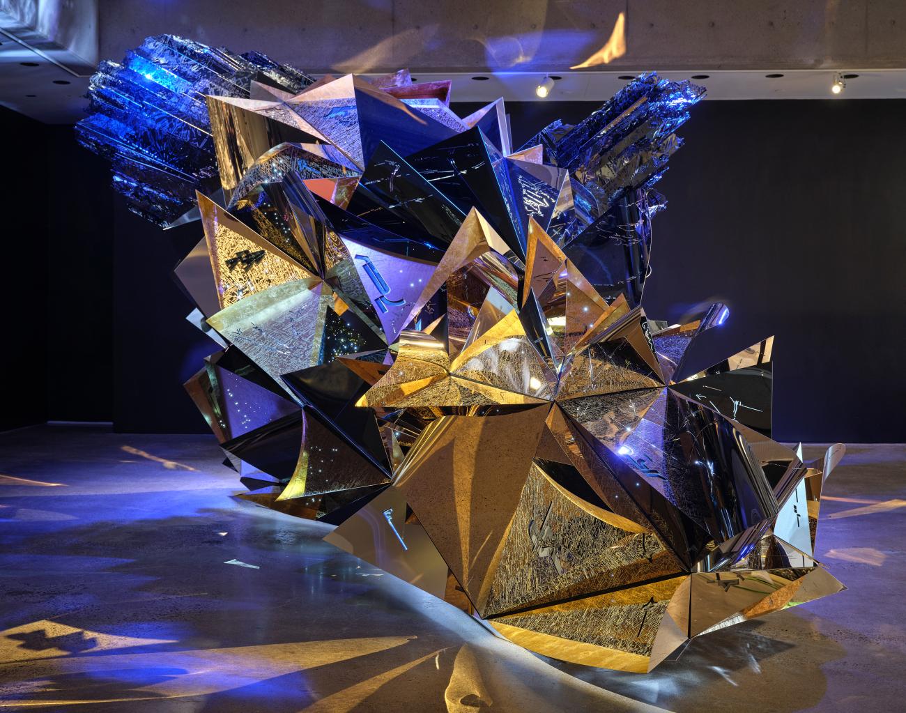 An installation shot of Ranbir Sidhu's installation Asteroid 3033 X1, a large metal sculpture.
