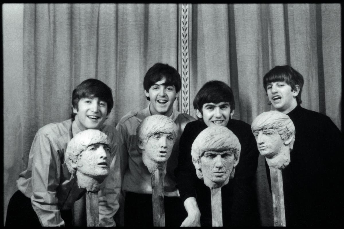 The Beatles with clay portrait busts by David Wynne, 1964 © 1964