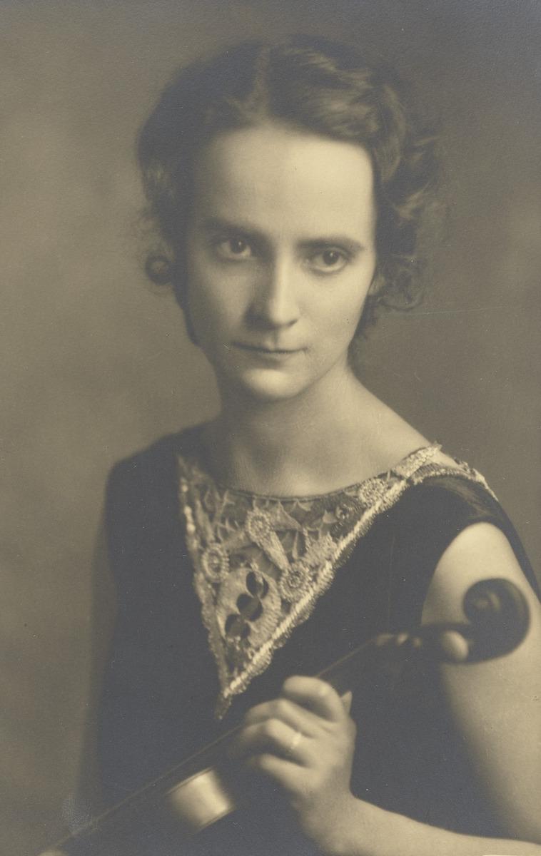 Edna Tacon Holding Violin