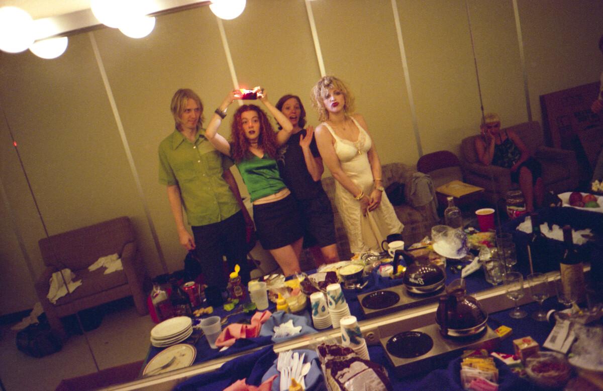 Melissa Auf der Maur, Self-Portrait in Mirror with Hole